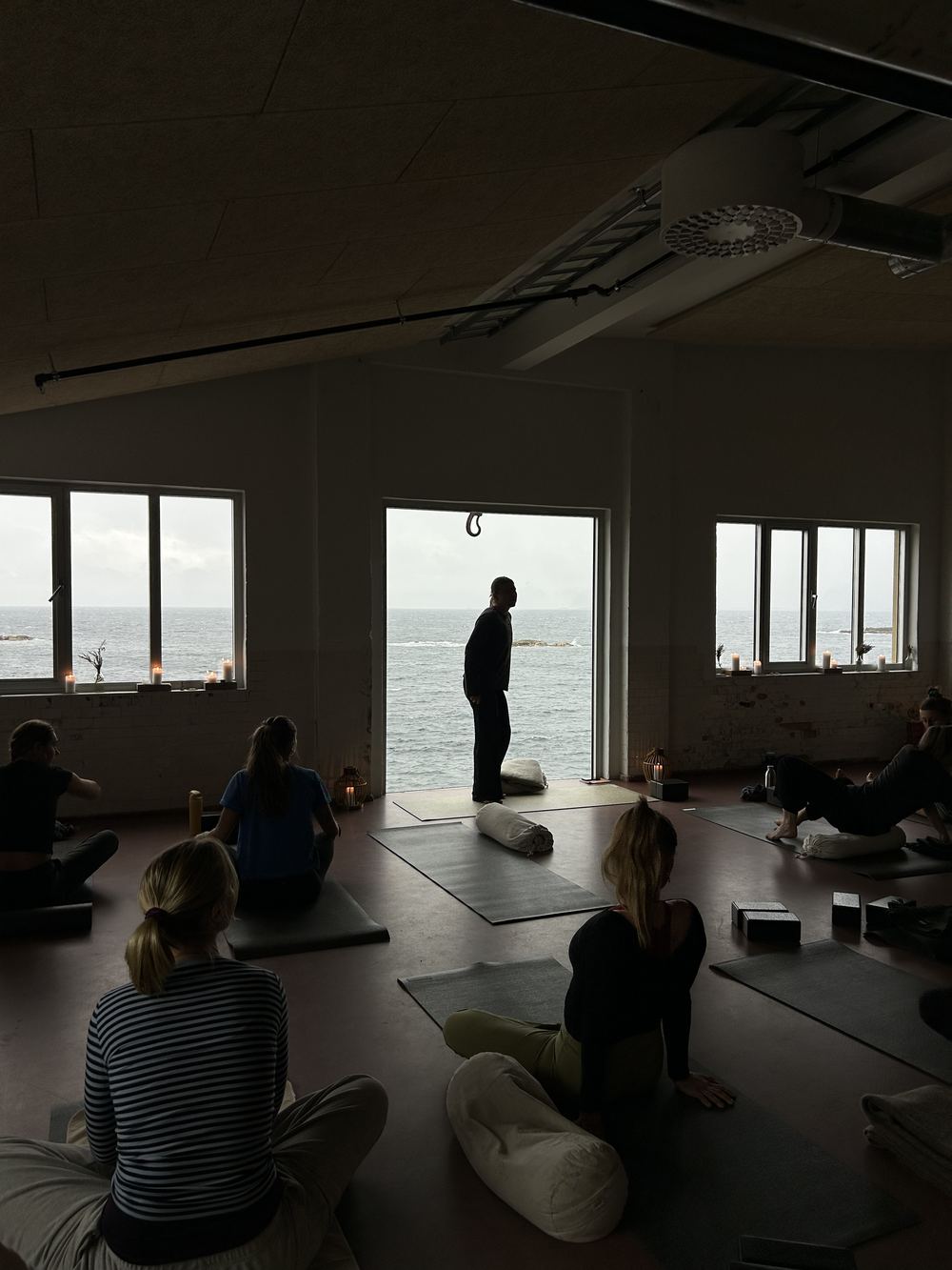 Yoga class at Trevarefabrikken with sea views, Henningsvær